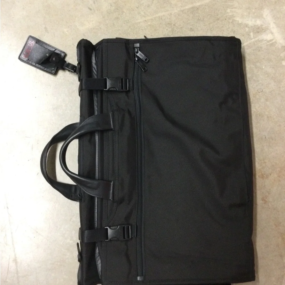 Tumi Black Men's Travel Duffel with Front Zip Pocket and Carry Handles